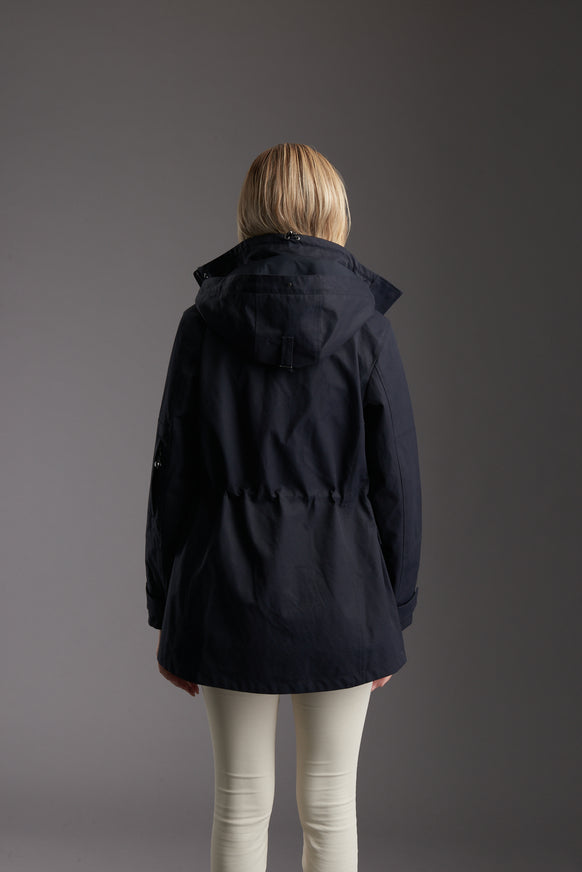 Back of Women's Marine Navy Waterproof Utility Field Jacket by Reeev